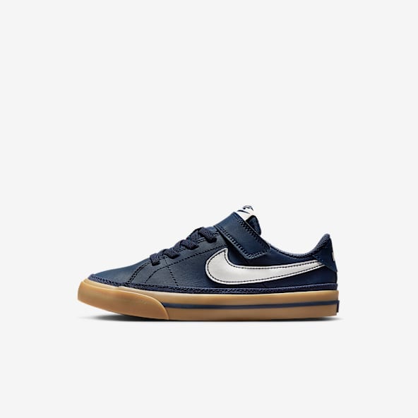 Boys navy nike shoes online